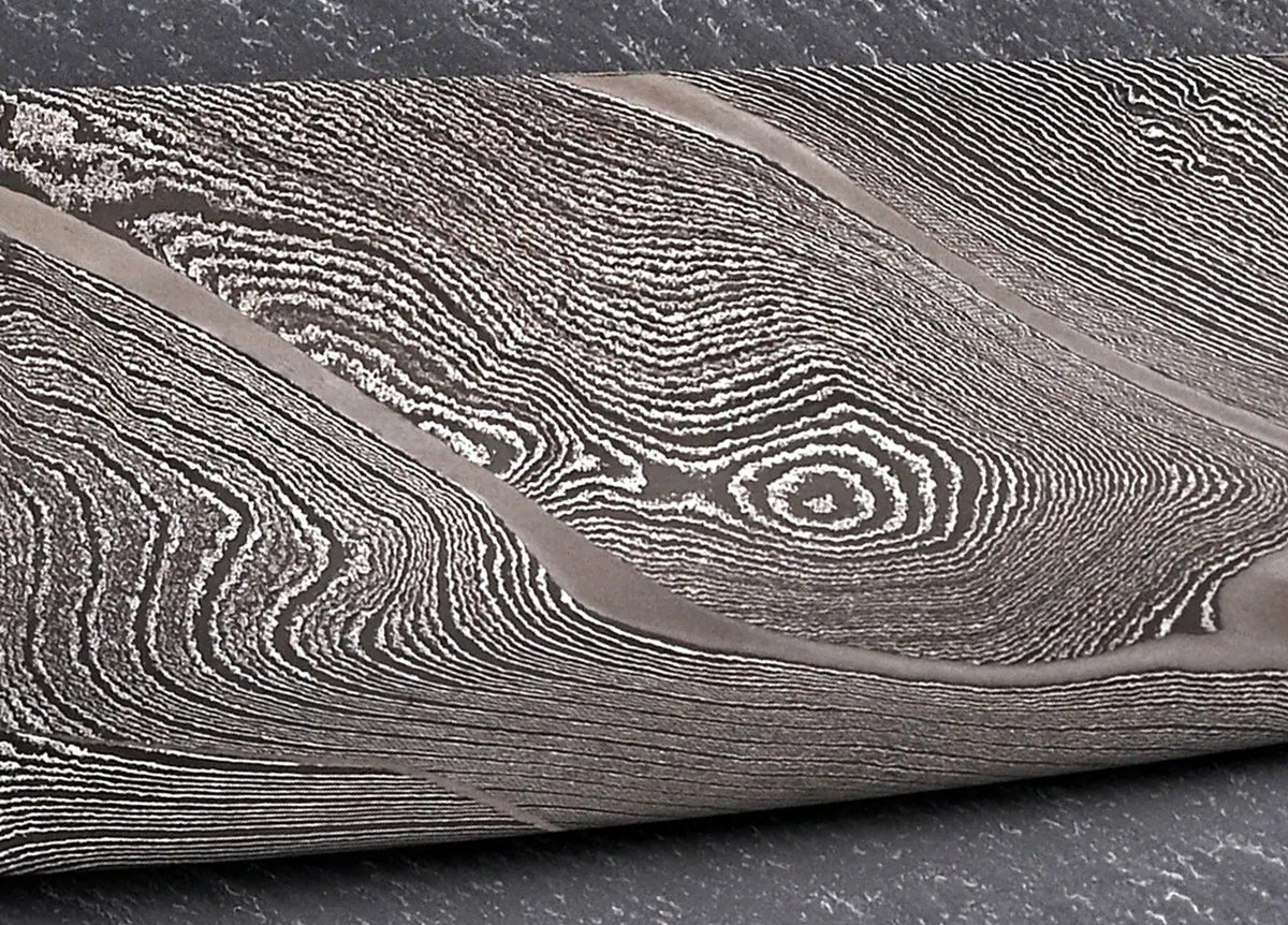 Detailaufnahme des Damastmusters – Petty 145 mm, Kanisterdamast