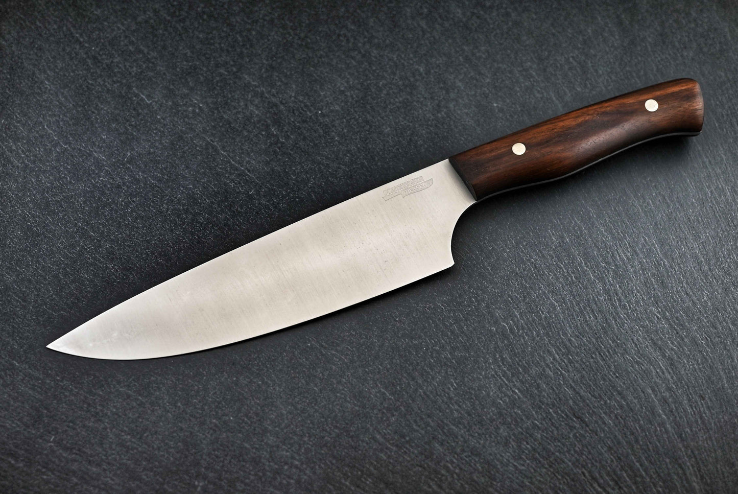 Paschinger Chefmesser 18 cm: rostfreier Stahl mit braunem Holzgriff und Nieten