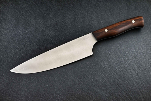 Paschinger Chefmesser 18 cm: rostfreier Stahl mit braunem Holzgriff und Nieten