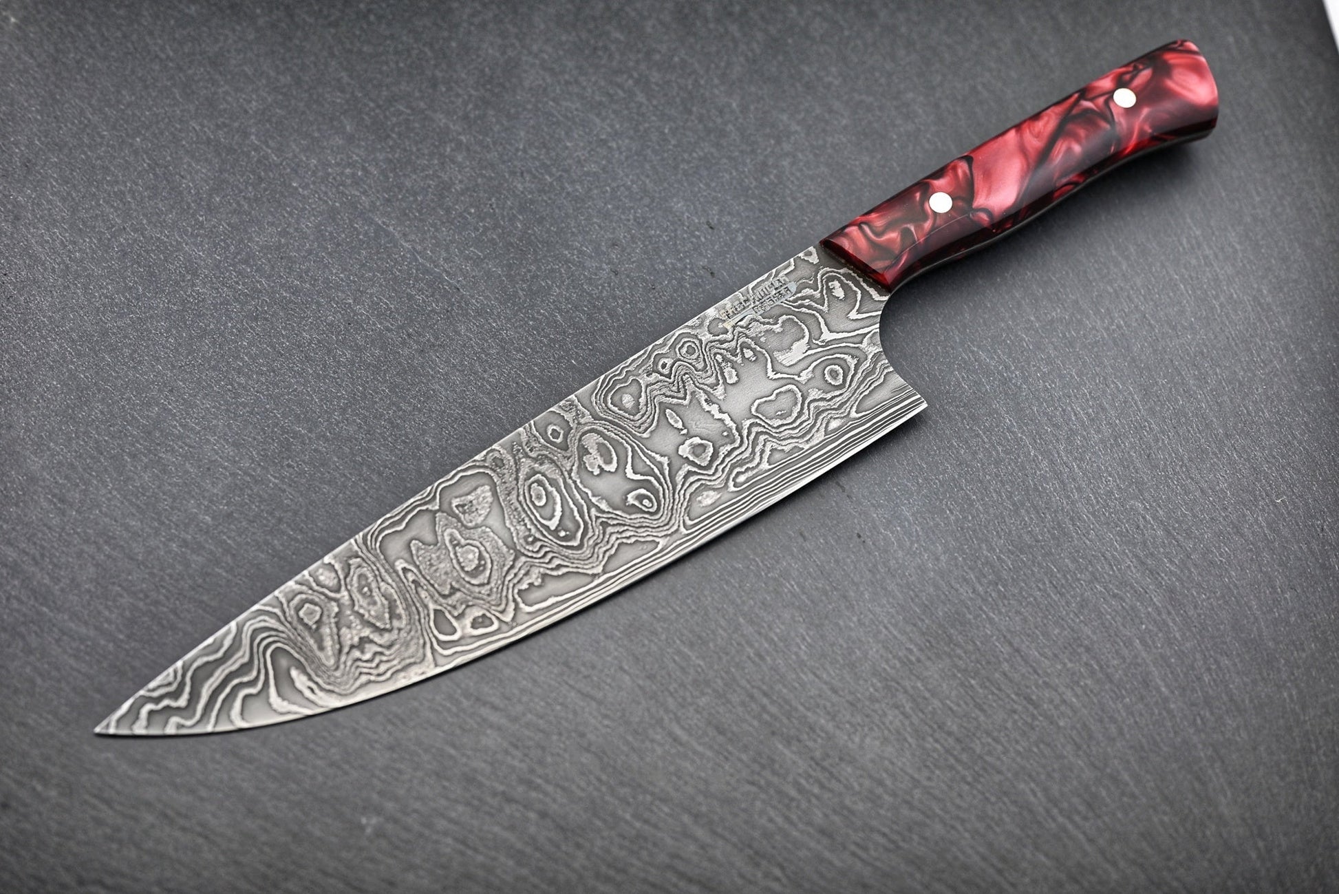 Damast-Kochmesser 22 cm mit roten Griffschalen, Damastklinge im Wildmuster